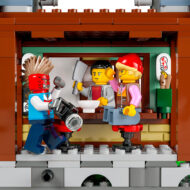 Vérifiez cette scène de LEGO avec des personnages colorés dans une cuisine moderne, illustrant la créativité et la divertissement avec des éléments de construction LEGO.