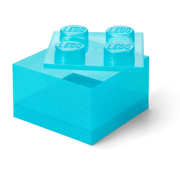 Lego en bleu transparent avec logo gravé, conçue pour la décoration ou la collection, évoque la créativité et l’univers de la construction de briques Lego.